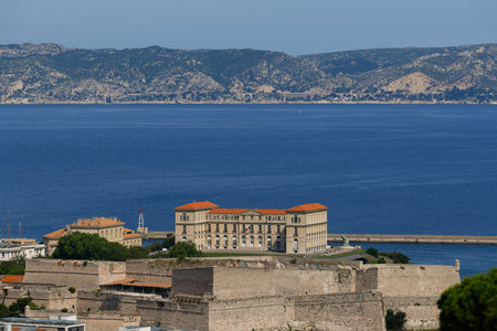 Marseille, France - June 7, 2024: Aerial View of Fortress Tower Historic Landmark Marina Port at Sunny summer Day.の写真素材