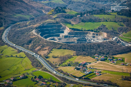 Scenic view of Urugne landscape with quarry and highway during daylight