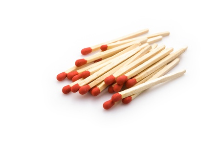 matchsticks stack up on white
