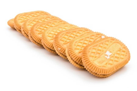 stacked sandwich biscuits with pink cream fillingの写真素材