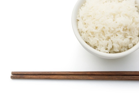 rice and chopstick on white with clipping pathの写真素材