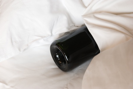 wine bottle wrapped by sheet, conceptional pictureの写真素材