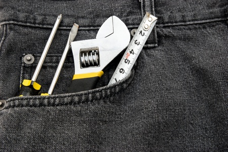 tools in a black jean front pocketの写真素材