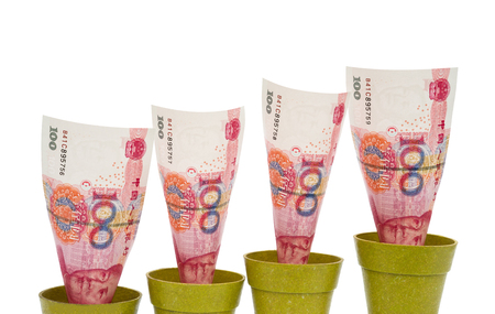 RMB rising on white background with clipping pathの写真素材