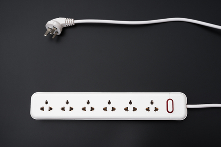 multi sockets power extension on blackの写真素材