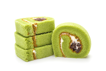 four pieces of yummy cake made by green tea and mung bean on a white backgroundの写真素材