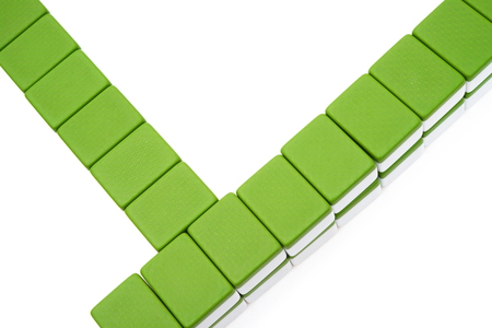 back of mahjong bricks on a white backgroundの写真素材