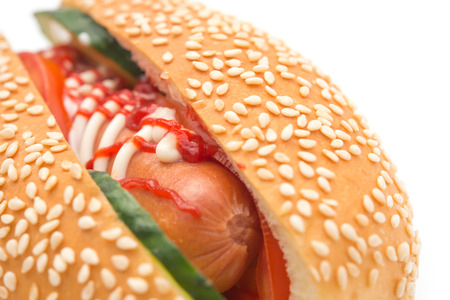 hot dog with cucumber on a white background close upの写真素材