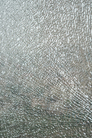 pattern of a broken glass window verticalの写真素材