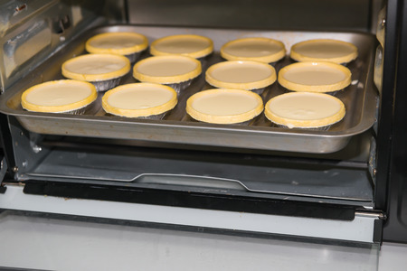 egg tarts in the makingの写真素材