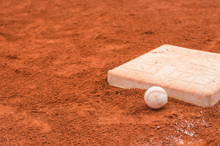 baseball and base on baseball field