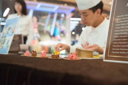 Macau, China - June 25, 2015:master making cartoon characters by chocolate in a hotel in New Sands Macau on June 25, 2015.のeditorial素材