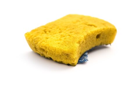 used double-side cleaning sponge on a white background