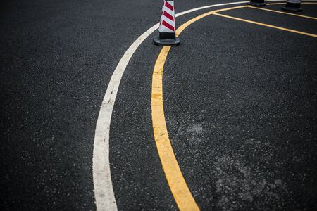 outdoor car parking lot with traffic cone