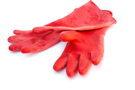 red gloves on a white backgroundの写真素材