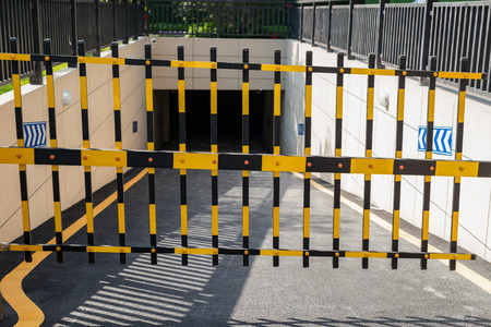 Vehicle security barrier closed - entrance to an underground car parkの写真素材