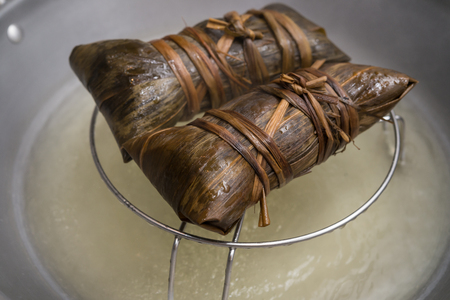 steaming glutinous rice dumplings for Dragon Boat Festival or DuanWu festivalの写真素材