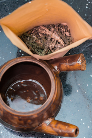 top view herbal near to an enamel potの写真素材