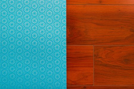 blue yoga met on wooden floorの写真素材