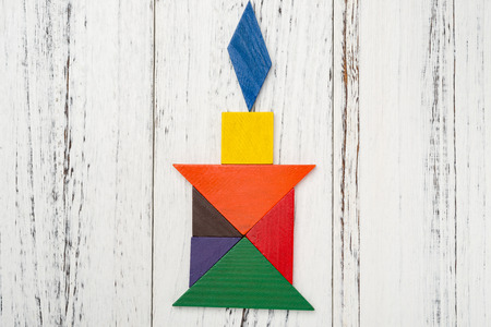 wooden tangram in a candle shapeの写真素材