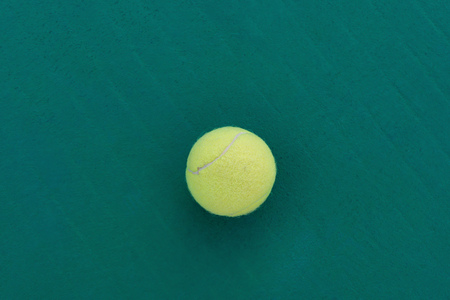 tennis ball on the floor in the middleの写真素材