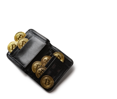 bitcoins in a wallet on white background with copy spaceの写真素材