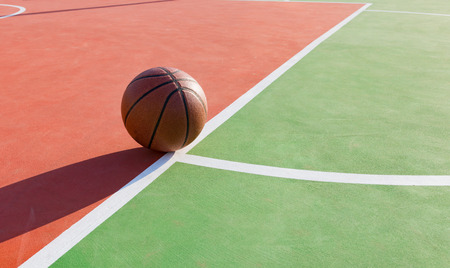basketball on an outdoor playing field in a day timeの写真素材