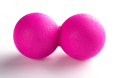 lilac massage ball on white backgroundの写真素材