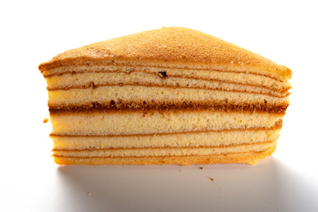homemade sandwich shape sponge cake on whiteの写真素材