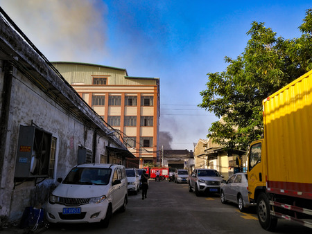 Zhongshan, China - October 28, 2018: a building catch a fire on the road