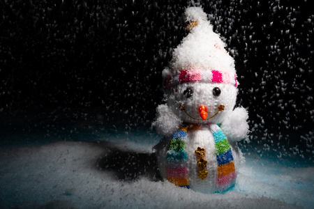 snowman highlighted in dark spaceの写真素材
