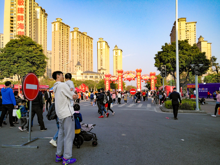 Foshan,Guangdong,China-Jan 27, 2019:People walking on the street selling things for the Chinese New Year.のeditorial素材