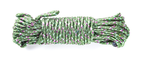 green tied rope on a white backgroundの写真素材