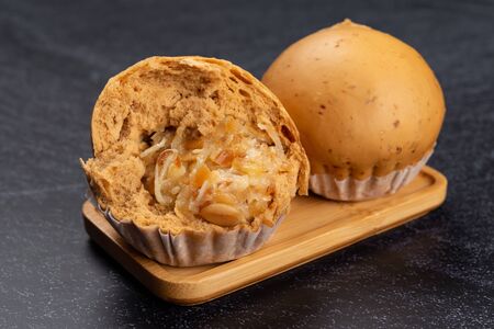 Shredded coconut buns on tableの写真素材