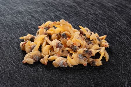 top view dry conch meat on dark backgroundの写真素材