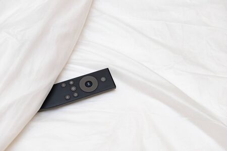 remote control on the bed