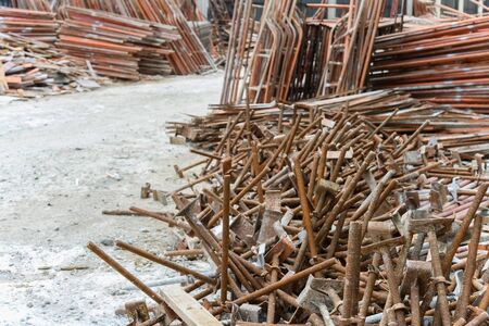 construction site with frames for scaffoldings aside