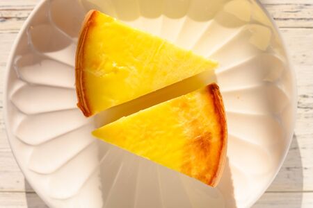 top view two pieces cheese cakes in a sunny morning