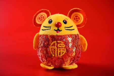rat mascot on red background the Chinese means fortuneの写真素材