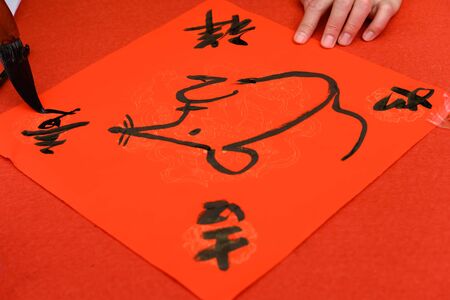 writing Chinese new year scrolls the Chinese means everything goes well as wishesの写真素材