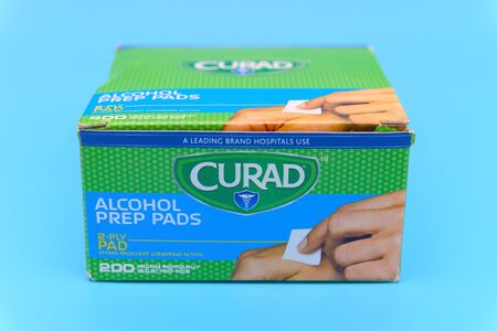 ZhongShan, China - February 5, 2020: Box of alcohol prep pads on blue background.のeditorial素材