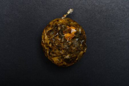 over ripe passion fruit on a dark backgroundの写真素材