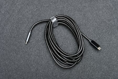 top view black type C cable on a dark backgroundの写真素材