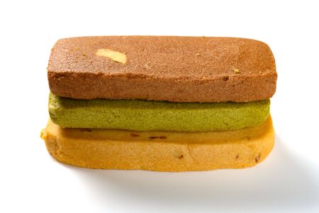 side view different flavors sweet cookies on white backgroundの写真素材