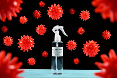 75% alcohol disinfectant surrounded by coronavirusの写真素材