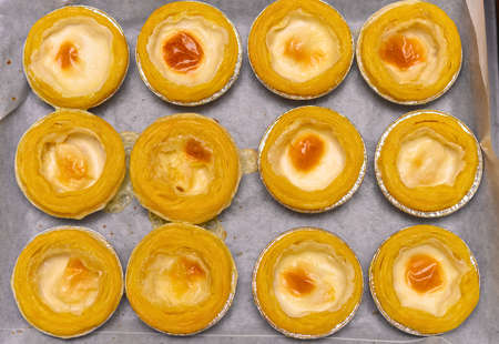 homemade fresh egg tarts just came out from an oven