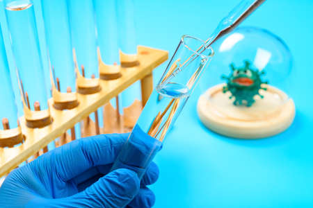 making medical vaccine with coronavirus on the back