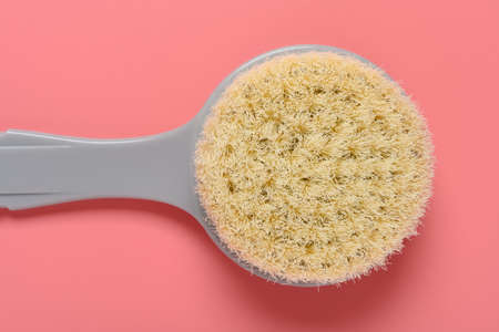 top view bath brush on a pink background close upの写真素材