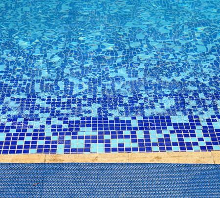 steps to a swimming pool in a sunny day