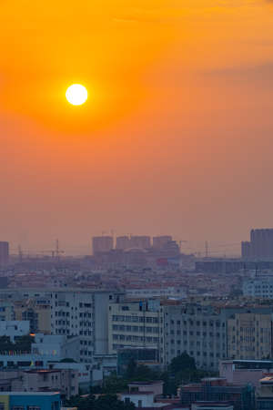 a Chinese suburb in sunset time vertical compositionの写真素材